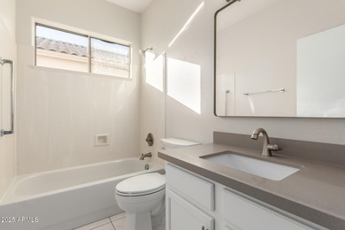 Tastefully remodeled home in Arizona Traditions 55+ guard-gated on Arizona Traditions Golf Club in Arizona - for sale on GolfHomes.com, golf home, golf lot