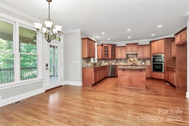 Welcome to 10817 Emerald Wood Drive! This elegant brick home in on Skybrook Golf Club in North Carolina - for sale on GolfHomes.com, golf home, golf lot