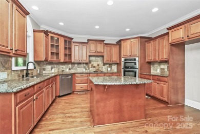 Welcome to 10817 Emerald Wood Drive! This elegant brick home in on Skybrook Golf Club in North Carolina - for sale on GolfHomes.com, golf home, golf lot