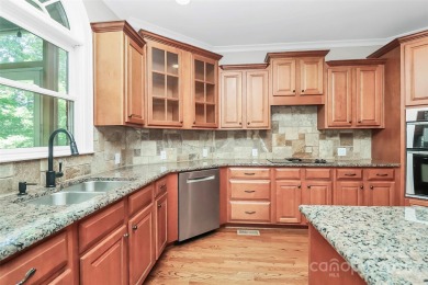 Welcome to 10817 Emerald Wood Drive! This elegant brick home in on Skybrook Golf Club in North Carolina - for sale on GolfHomes.com, golf home, golf lot