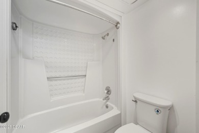 Move-In Ready Top Floor 1BR/1BA Condo in Gated Golf Course on The Club At Pelican Bay - South Course in Florida - for sale on GolfHomes.com, golf home, golf lot