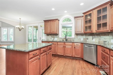 Welcome to 10817 Emerald Wood Drive! This elegant brick home in on Skybrook Golf Club in North Carolina - for sale on GolfHomes.com, golf home, golf lot