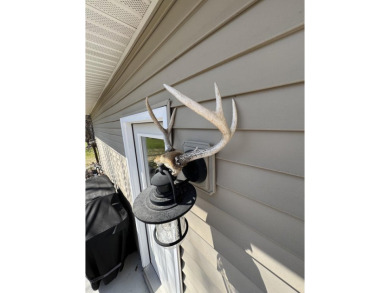 Welcome to 3787 Buzzell Rd. This beautifully updated 4-bedroom on Gladwin Heights Golf Course in Michigan - for sale on GolfHomes.com, golf home, golf lot