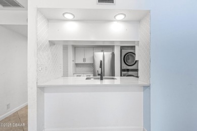 Move-In Ready Top Floor 1BR/1BA Condo in Gated Golf Course on The Club At Pelican Bay - South Course in Florida - for sale on GolfHomes.com, golf home, golf lot