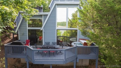 Located in the exclusive golf cart community of Tan Tar A on The Oaks Golf Course in Missouri - for sale on GolfHomes.com, golf home, golf lot