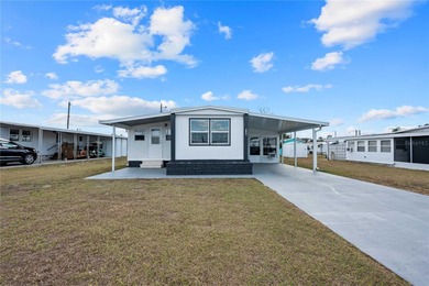 Welcome home to 37240 Beverly Avenue, where thoughtful on Betmar Acres Golf Club in Florida - for sale on GolfHomes.com, golf home, golf lot