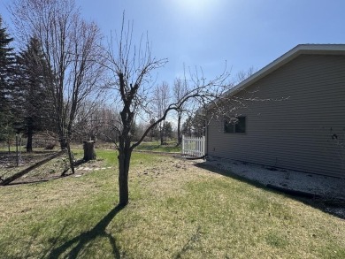 Welcome to 3787 Buzzell Rd. This beautifully updated 4-bedroom on Gladwin Heights Golf Course in Michigan - for sale on GolfHomes.com, golf home, golf lot
