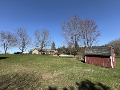 Welcome to 3787 Buzzell Rd. This beautifully updated 4-bedroom on Gladwin Heights Golf Course in Michigan - for sale on GolfHomes.com, golf home, golf lot
