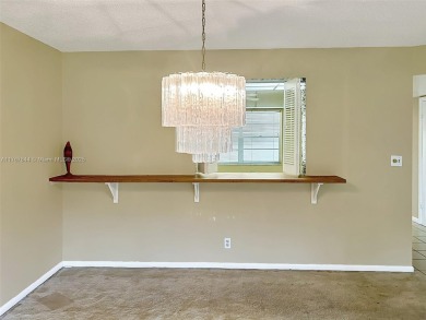 Ready to create your dream home? This spacious 2/2 first-floor on Hollybrook Golf and Tennis Club  in Florida - for sale on GolfHomes.com, golf home, golf lot
