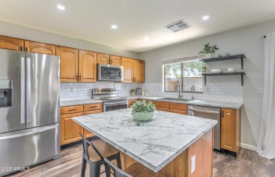 Golf Course Views = Slice of Paradise! This trendy 3-bedroom, 2 on Western Skies Golf Club in Arizona - for sale on GolfHomes.com, golf home, golf lot