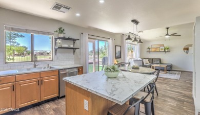 Golf Course Views = Slice of Paradise! This trendy 3-bedroom, 2 on Western Skies Golf Club in Arizona - for sale on GolfHomes.com, golf home, golf lot