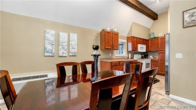 Located in the exclusive golf cart community of Tan Tar A on The Oaks Golf Course in Missouri - for sale on GolfHomes.com, golf home, golf lot
