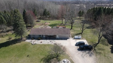 Welcome to 3787 Buzzell Rd. This beautifully updated 4-bedroom on Gladwin Heights Golf Course in Michigan - for sale on GolfHomes.com, golf home, golf lot