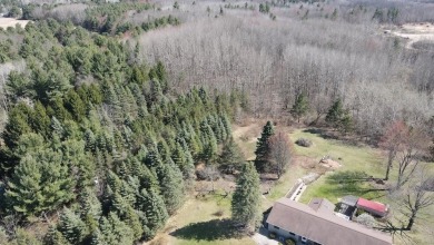 Welcome to 3787 Buzzell Rd. This beautifully updated 4-bedroom on Gladwin Heights Golf Course in Michigan - for sale on GolfHomes.com, golf home, golf lot