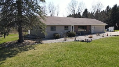 Welcome to 3787 Buzzell Rd. This beautifully updated 4-bedroom on Gladwin Heights Golf Course in Michigan - for sale on GolfHomes.com, golf home, golf lot