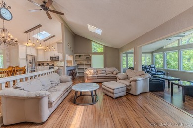 Located in the iconic Tan Tar A Estates, just steps from on The Oaks Golf Course in Missouri - for sale on GolfHomes.com, golf home, golf lot