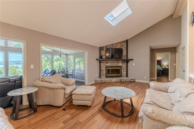 Located in the iconic Tan Tar A Estates, just steps from on The Oaks Golf Course in Missouri - for sale on GolfHomes.com, golf home, golf lot