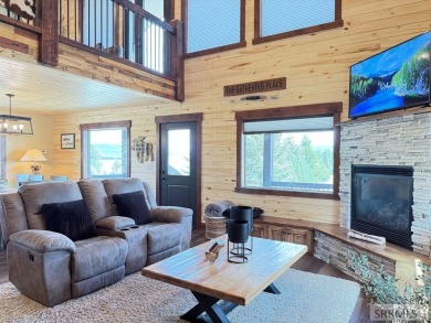 Stunning cabin in Island Park where rustic elegance meets on Island Park Village Resort Golf Course in Idaho - for sale on GolfHomes.com, golf home, golf lot