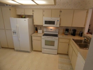 This beautiful 2-bedroom, 2-bath condo in the Eagleswood section on Beacon Woods Golf Club in Florida - for sale on GolfHomes.com, golf home, golf lot