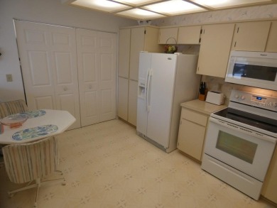 This beautiful 2-bedroom, 2-bath condo in the Eagleswood section on Beacon Woods Golf Club in Florida - for sale on GolfHomes.com, golf home, golf lot