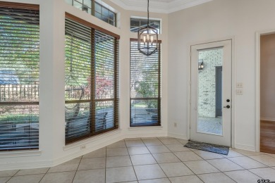 Located in Hollytree, this stunning home offers 4 spacious on Hollytree Country Club in Texas - for sale on GolfHomes.com, golf home, golf lot