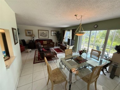 SPACIOUS ONE BEDROOM & ONE & A HALF BATH CONDO LOCATED ON THE on The Diplomat Golf Resort and Spa in Florida - for sale on GolfHomes.com, golf home, golf lot