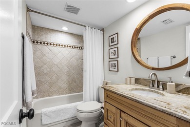 Discover luxury living in this fully furnished, turnkey on Fiddlesticks Country Club in Florida - for sale on GolfHomes.com, golf home, golf lot