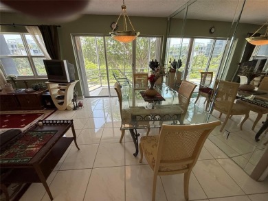 SPACIOUS ONE BEDROOM & ONE & A HALF BATH CONDO LOCATED ON THE on The Diplomat Golf Resort and Spa in Florida - for sale on GolfHomes.com, golf home, golf lot