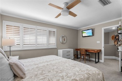 Discover luxury living in this fully furnished, turnkey on Fiddlesticks Country Club in Florida - for sale on GolfHomes.com, golf home, golf lot