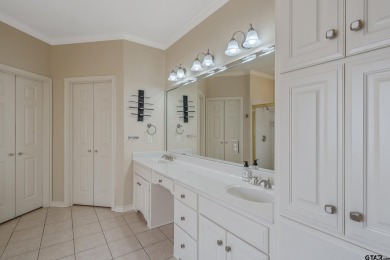 Located in Hollytree, this stunning home offers 4 spacious on Hollytree Country Club in Texas - for sale on GolfHomes.com, golf home, golf lot