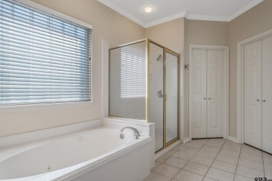 Located in Hollytree, this stunning home offers 4 spacious on Hollytree Country Club in Texas - for sale on GolfHomes.com, golf home, golf lot
