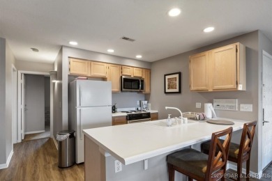 Welcome to this beautiful duplex-style condominium in the on Seasons Ridge At Four Seasons in Missouri - for sale on GolfHomes.com, golf home, golf lot