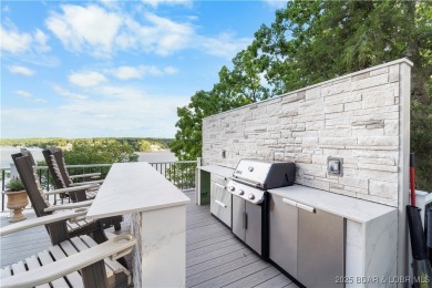 Nestled in the coveted Black Hawk Estates on a scenic bluff with on Seasons Ridge At Four Seasons in Missouri - for sale on GolfHomes.com, golf home, golf lot