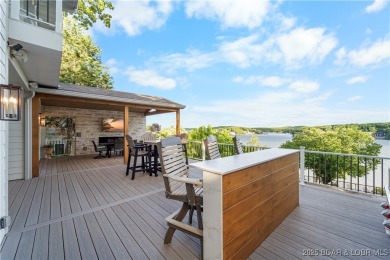 Nestled in the coveted Black Hawk Estates on a scenic bluff with on Seasons Ridge At Four Seasons in Missouri - for sale on GolfHomes.com, golf home, golf lot