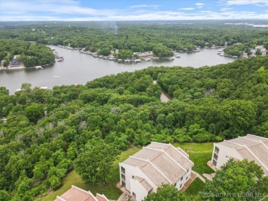 Welcome to this beautiful duplex-style condominium in the on Seasons Ridge At Four Seasons in Missouri - for sale on GolfHomes.com, golf home, golf lot