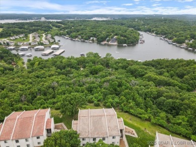 Welcome to this beautiful duplex-style condominium in the on Seasons Ridge At Four Seasons in Missouri - for sale on GolfHomes.com, golf home, golf lot