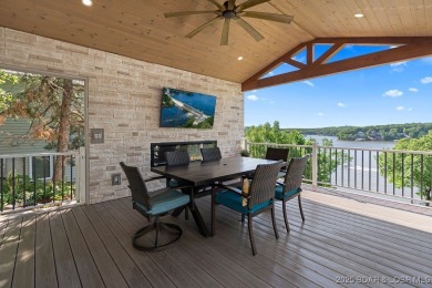 Nestled in the coveted Black Hawk Estates on a scenic bluff with on Seasons Ridge At Four Seasons in Missouri - for sale on GolfHomes.com, golf home, golf lot