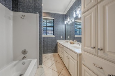 Located in Hollytree, this stunning home offers 4 spacious on Hollytree Country Club in Texas - for sale on GolfHomes.com, golf home, golf lot