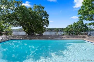 Nestled in the coveted Black Hawk Estates on a scenic bluff with on Seasons Ridge At Four Seasons in Missouri - for sale on GolfHomes.com, golf home, golf lot