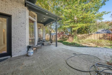 Located in Hollytree, this stunning home offers 4 spacious on Hollytree Country Club in Texas - for sale on GolfHomes.com, golf home, golf lot