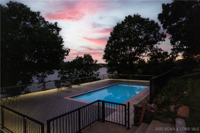 Nestled in the coveted Black Hawk Estates on a scenic bluff with on Seasons Ridge At Four Seasons in Missouri - for sale on GolfHomes.com, golf home, golf lot