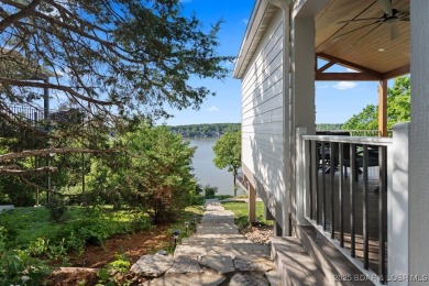 Nestled in the coveted Black Hawk Estates on a scenic bluff with on Seasons Ridge At Four Seasons in Missouri - for sale on GolfHomes.com, golf home, golf lot