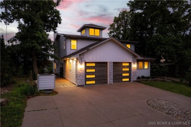 Nestled in the coveted Black Hawk Estates on a scenic bluff with on Seasons Ridge At Four Seasons in Missouri - for sale on GolfHomes.com, golf home, golf lot