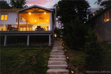 Nestled in the coveted Black Hawk Estates on a scenic bluff with on Seasons Ridge At Four Seasons in Missouri - for sale on GolfHomes.com, golf home, golf lot