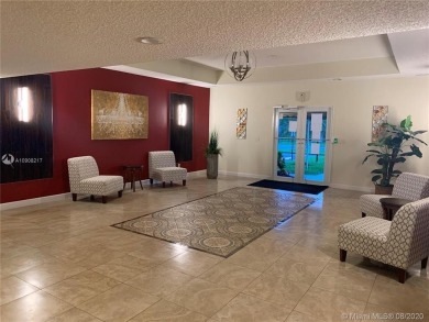 SPACIOUS ONE BEDROOM & ONE & A HALF BATH CONDO LOCATED ON THE on The Diplomat Golf Resort and Spa in Florida - for sale on GolfHomes.com, golf home, golf lot