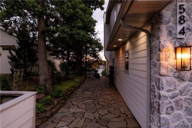 Nestled in the coveted Black Hawk Estates on a scenic bluff with on Seasons Ridge At Four Seasons in Missouri - for sale on GolfHomes.com, golf home, golf lot