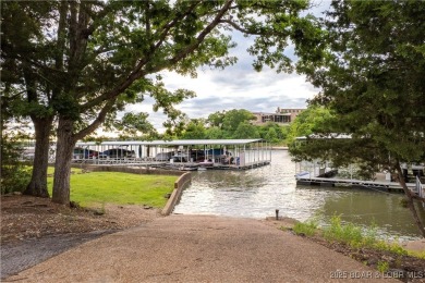 Nestled in the coveted Black Hawk Estates on a scenic bluff with on Seasons Ridge At Four Seasons in Missouri - for sale on GolfHomes.com, golf home, golf lot