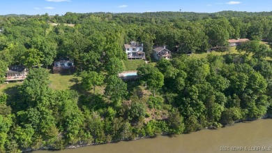 Nestled in the coveted Black Hawk Estates on a scenic bluff with on Seasons Ridge At Four Seasons in Missouri - for sale on GolfHomes.com, golf home, golf lot