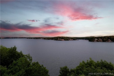 Nestled in the coveted Black Hawk Estates on a scenic bluff with on Seasons Ridge At Four Seasons in Missouri - for sale on GolfHomes.com, golf home, golf lot