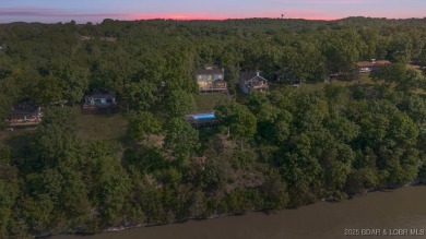 Nestled in the coveted Black Hawk Estates on a scenic bluff with on Seasons Ridge At Four Seasons in Missouri - for sale on GolfHomes.com, golf home, golf lot